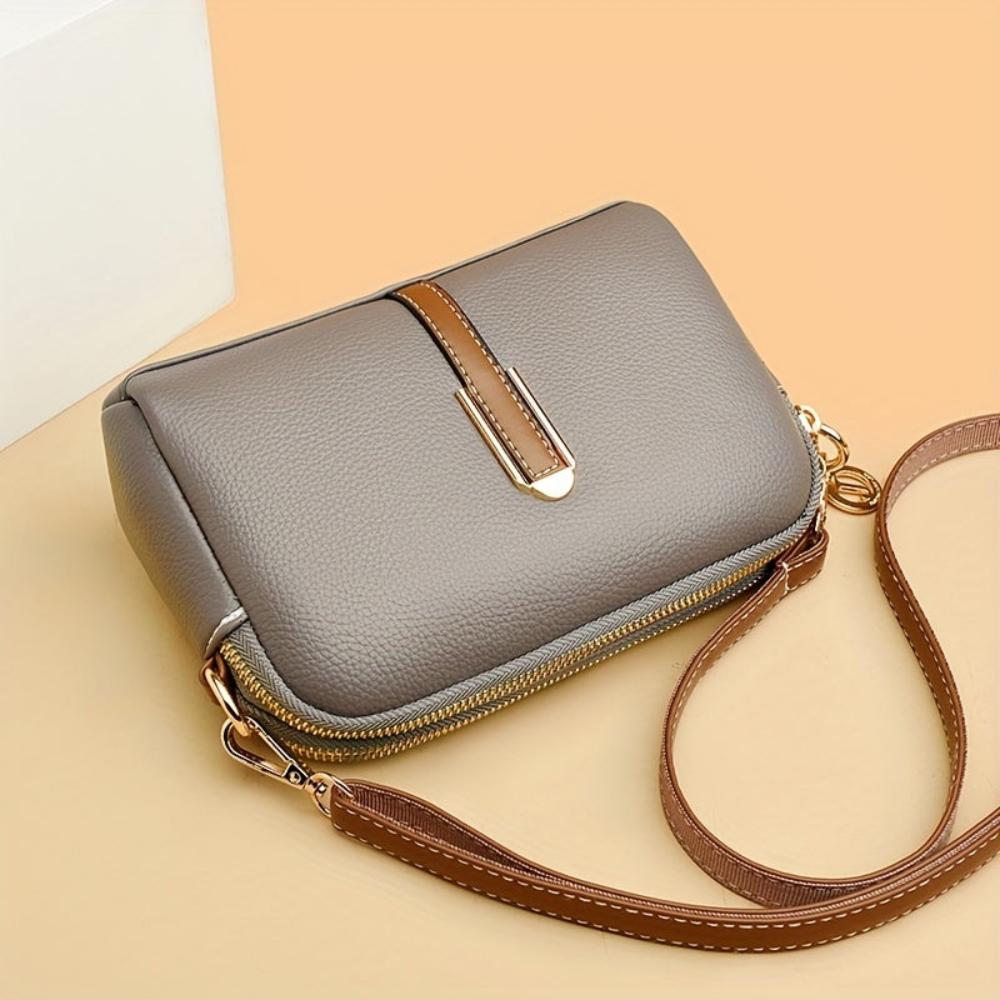 Mila Litchi Crossbody Tasche mit Prägung